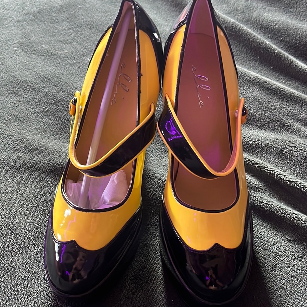 Yellow and black heels